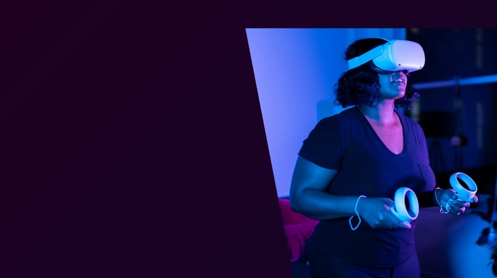 Person in VR headset explores immersive digital experiences, signifying AR/VR's impact on 2024 customer engagement